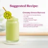 A creamy green smoothie served in a glass can-shaped cup garnished with a kiwi slice. Text shows a suggested recipe for a Creamy Green Harvest made with Smartfruit Harvest Greens, milk, avocado, coconut yogurt, and ice, with instructions to blend until smooth.