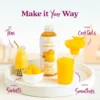 A Smartfruit Mellow Mango purée mix bottle displayed on a white tray surrounded by mango beverages and desserts including tea, sorbet, smoothies, and cocktails. Text highlights different uses: teas, sorbets, cocktails, and smoothies.