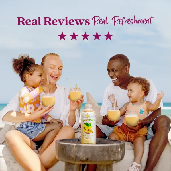 A smiling family sitting outdoors near the ocean enjoys banana smoothies together while a bottle of Smartfruit Sunny Banana purée mix sits on a table in front of them. Text above reads “Real Reviews, Real Refreshment” with five stars.