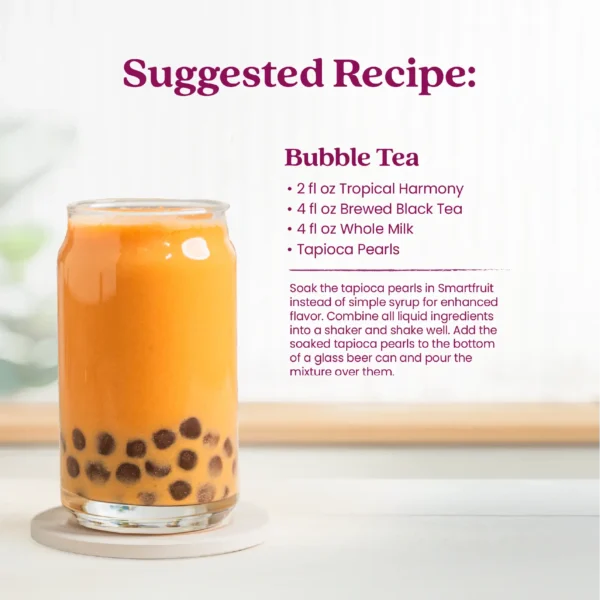 A glass of bubble tea with tapioca pearls served in a clear glass. Text shows a suggested recipe for Bubble Tea made with Tropical Harmony purée, brewed black tea, whole milk, and tapioca pearls.