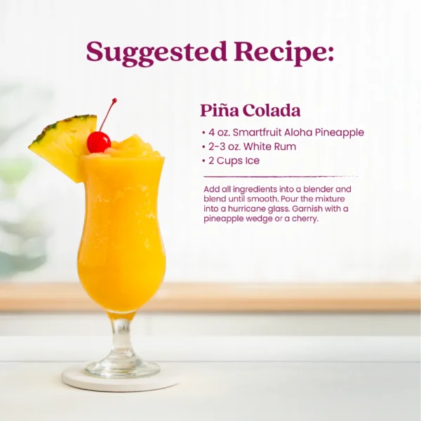 A bright pineapple piña colada served in a hurricane glass garnished with a pineapple wedge and cherry. Text shows a suggested recipe for a Piña Colada made with Smartfruit Aloha Pineapple, white rum, and ice, with instructions to blend and garnish.
