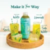 A Smartfruit Restore Refresher bottle placed on a woven tray surrounded by different drink options including refreshers mixed with water, lemonade, soda water, and a mint cocktail. Text highlights ways to mix the product including water, lemonade, soda water, and spirits.