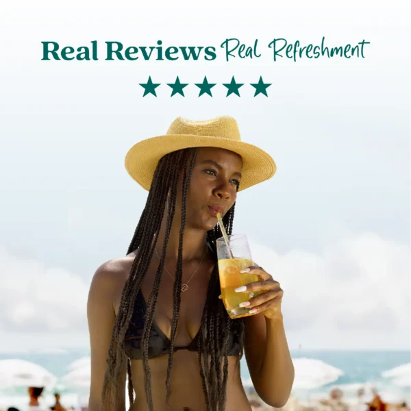 A woman wearing a straw hat stands on a sunny beach while drinking a bright tropical refresher through a straw. Text above reads “Real Reviews, Real Refreshment” with five stars.