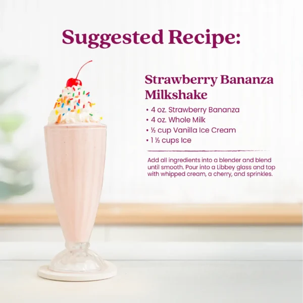 A creamy strawberry banana milkshake served in a tall milkshake glass topped with whipped cream, colorful sprinkles, and a cherry. Text shows a suggested recipe for a Strawberry Bananza Milkshake made with Strawberry Bananza purée mix, whole milk, vanilla ice cream, and ice.