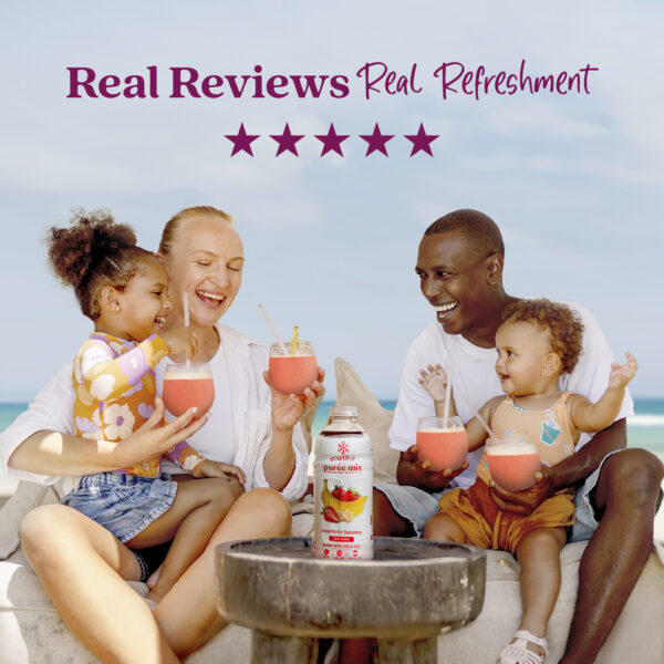 A smiling family sitting outdoors near the ocean enjoys strawberry smoothies together while a bottle of Smartfruit Summer Strawberry purée mix sits on a table in front of them. Text above reads “Real Reviews, Real Refreshment” with five stars.