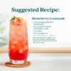 A tall glass of pink strawberry lemonade drink filled with ice and garnished with a fresh strawberry and lemon slice. Text shows a suggested recipe called Strawberry Lemonade made with Smartfruit Restart Lemonade, Smartfruit Renew Strawberry Açaí, water, and crushed ice.