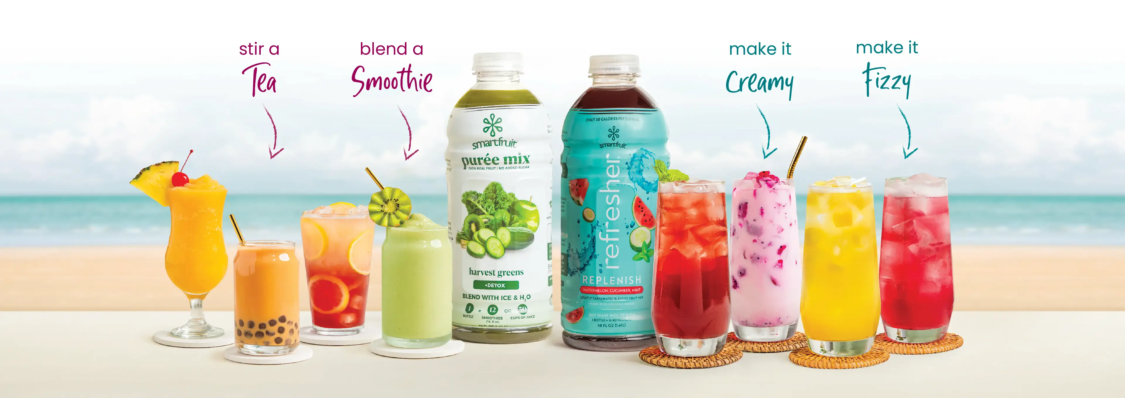 Assortment of Smartfruit bottles and prepared drinks on a beach background
